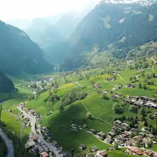 Bird's eye view photography of village near mountain — Grindelwald, Switzerland