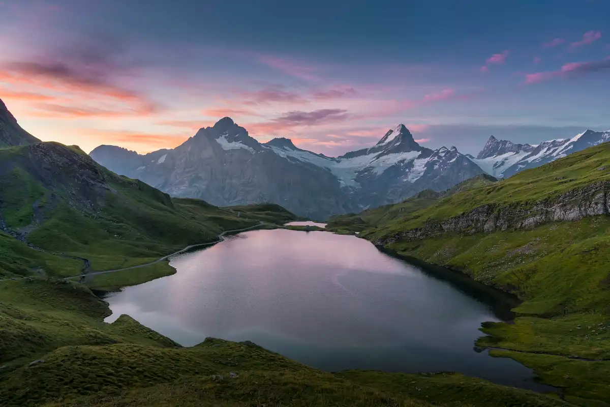 Lake in the middle of green mountains — Bachalpsee, Switzerland