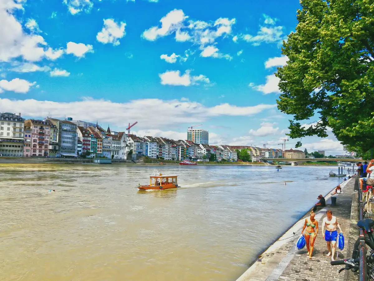 A river with a boat in it — Basel, Switzerland