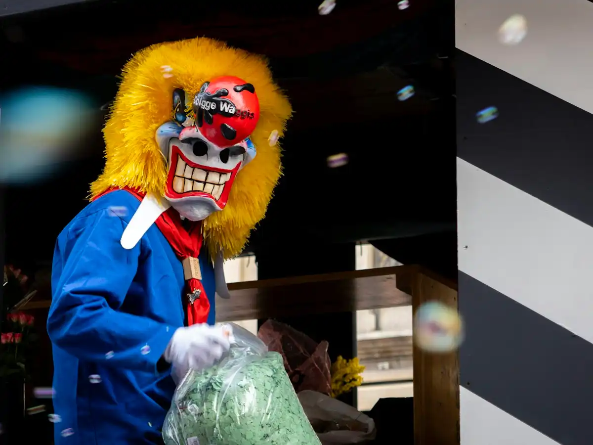 A person in a scary clown costume with yellow hair — Basel Fasnacht, Switzerland
